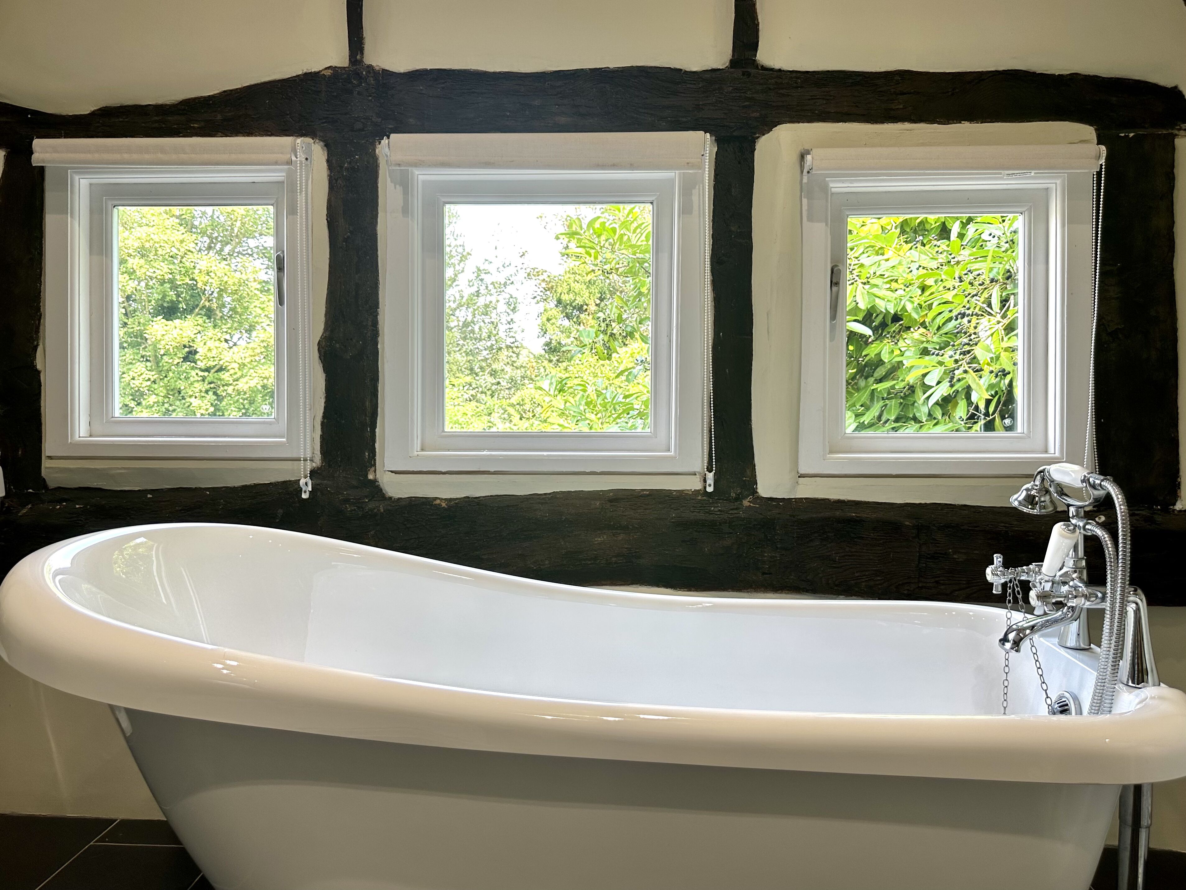 Deluxe-Doppelzimmer | Badezimmer | Haartrockner, Handtücher, Seife, Shampoo