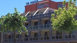 A multi-story building with a sign reading "TIA MARIA". - TM Deluxe Hotel (Sunny Beach)