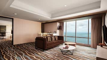Executive Suite | Living area | 42-inch LCD TV with cable channels, TV