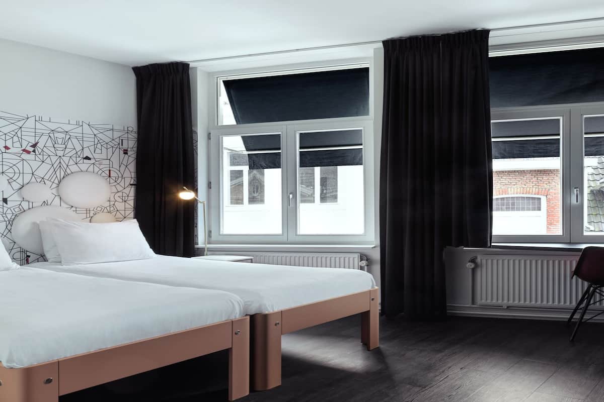 classic twin room | in-room safe, desk, iron/ironing board, cots/infant beds