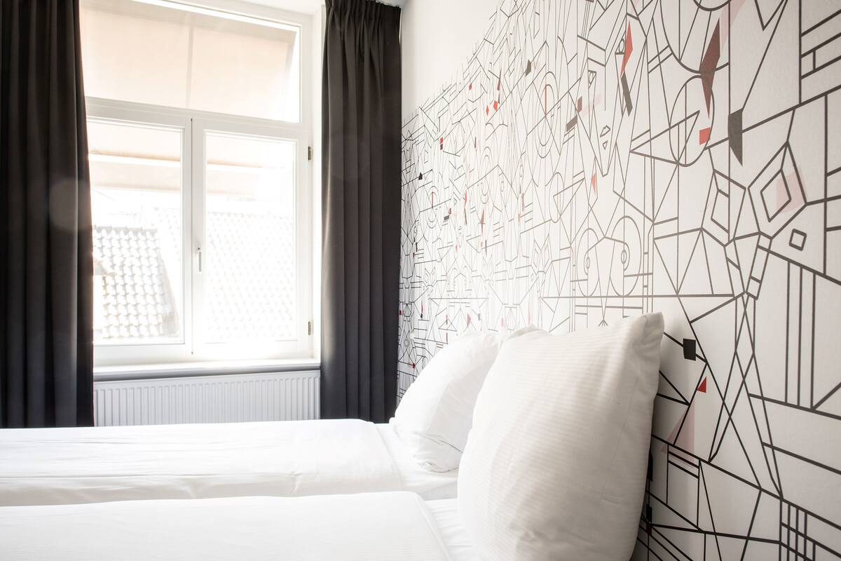 family room | in-room safe, desk, iron/ironing board, cots/infant beds