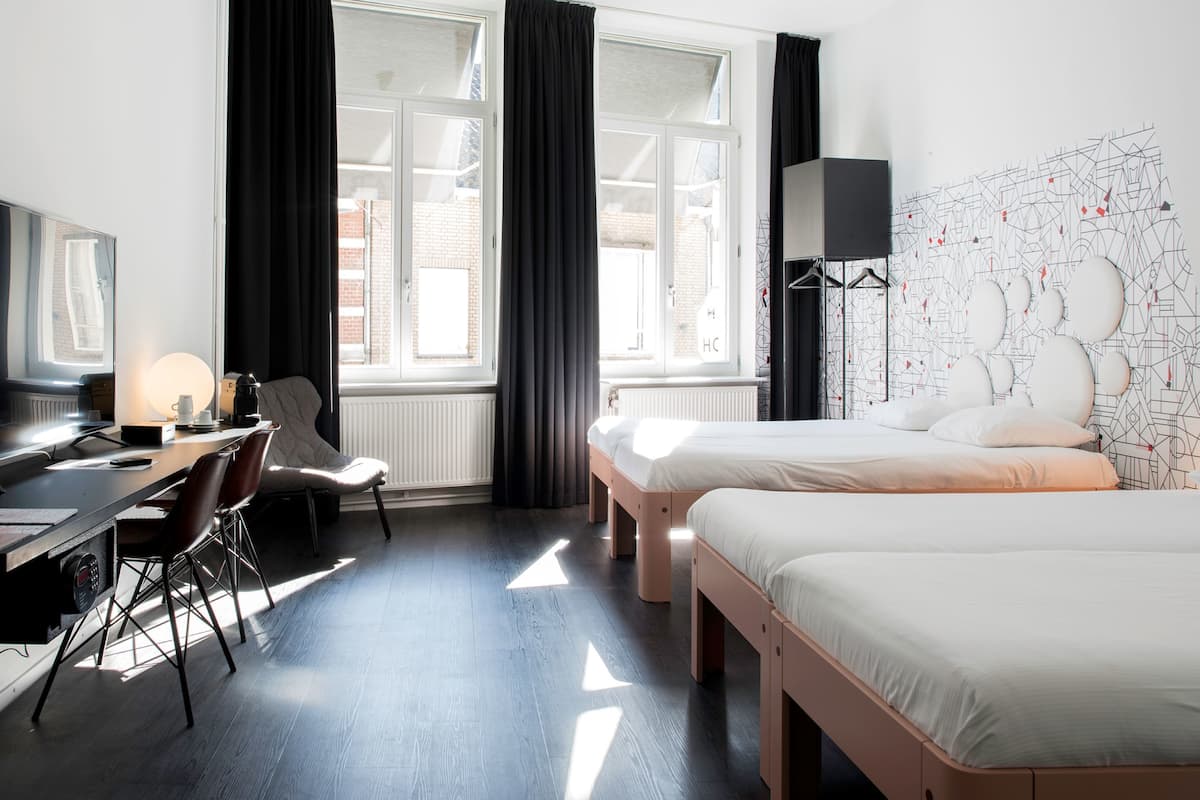 family room | in-room safe, desk, iron/ironing board, cots/infant beds