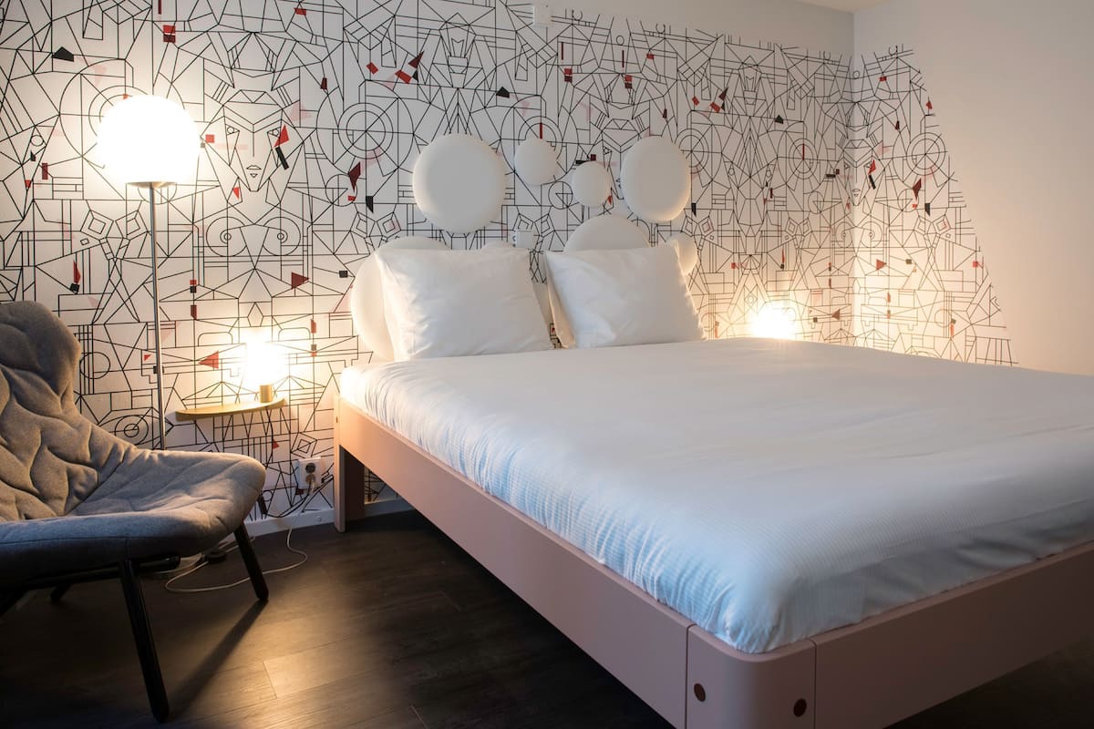 superior room, 1 king bed | in-room safe, desk, iron/ironing board, cots/infant beds