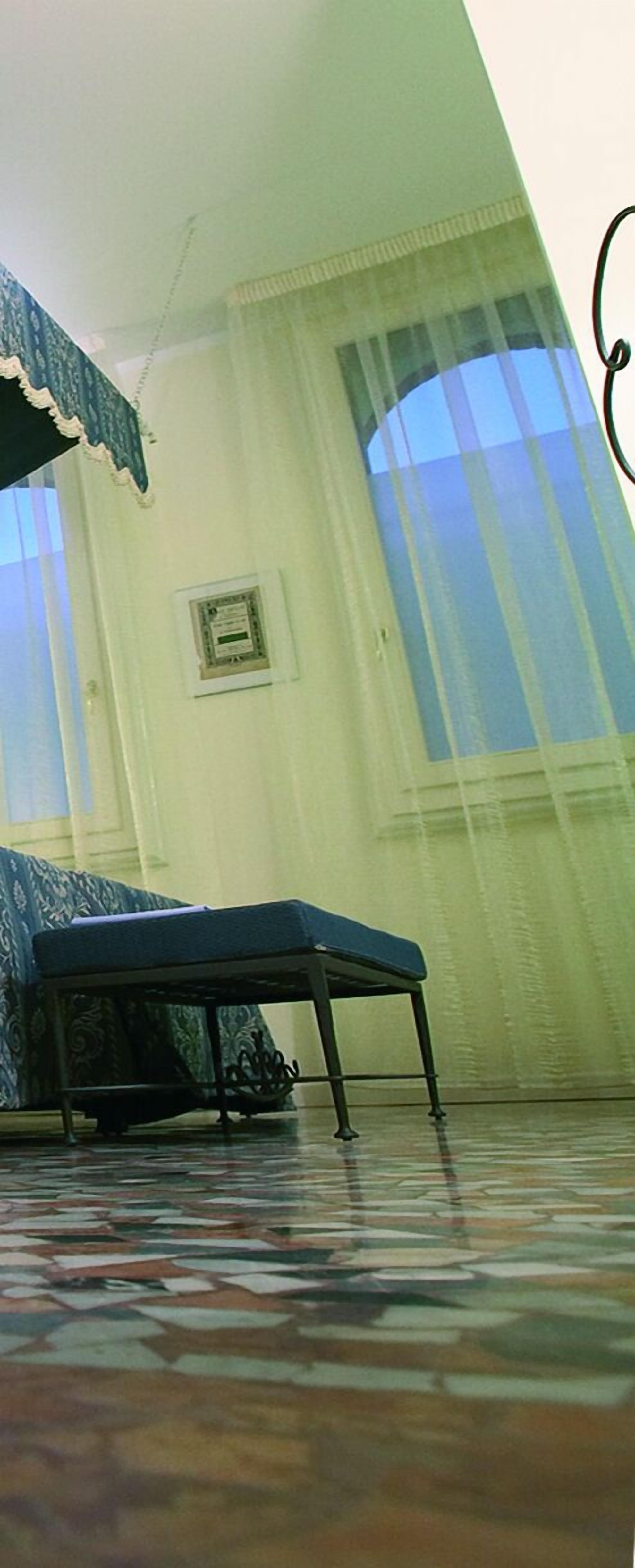 superior double or twin room | living area | flat-screen tv