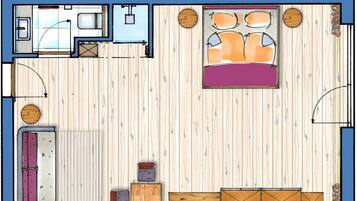 A bedroom with a bed, bedside tables, a wardrobe, and a small seating area.