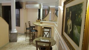 Presidential Duplex, 1 Bedroom | Living area | 32-inch LCD TV with cable channels, TV