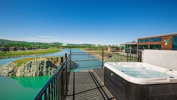 Seasonal outdoor pool, open 9 AM to 9:00 PM, pool umbrellas