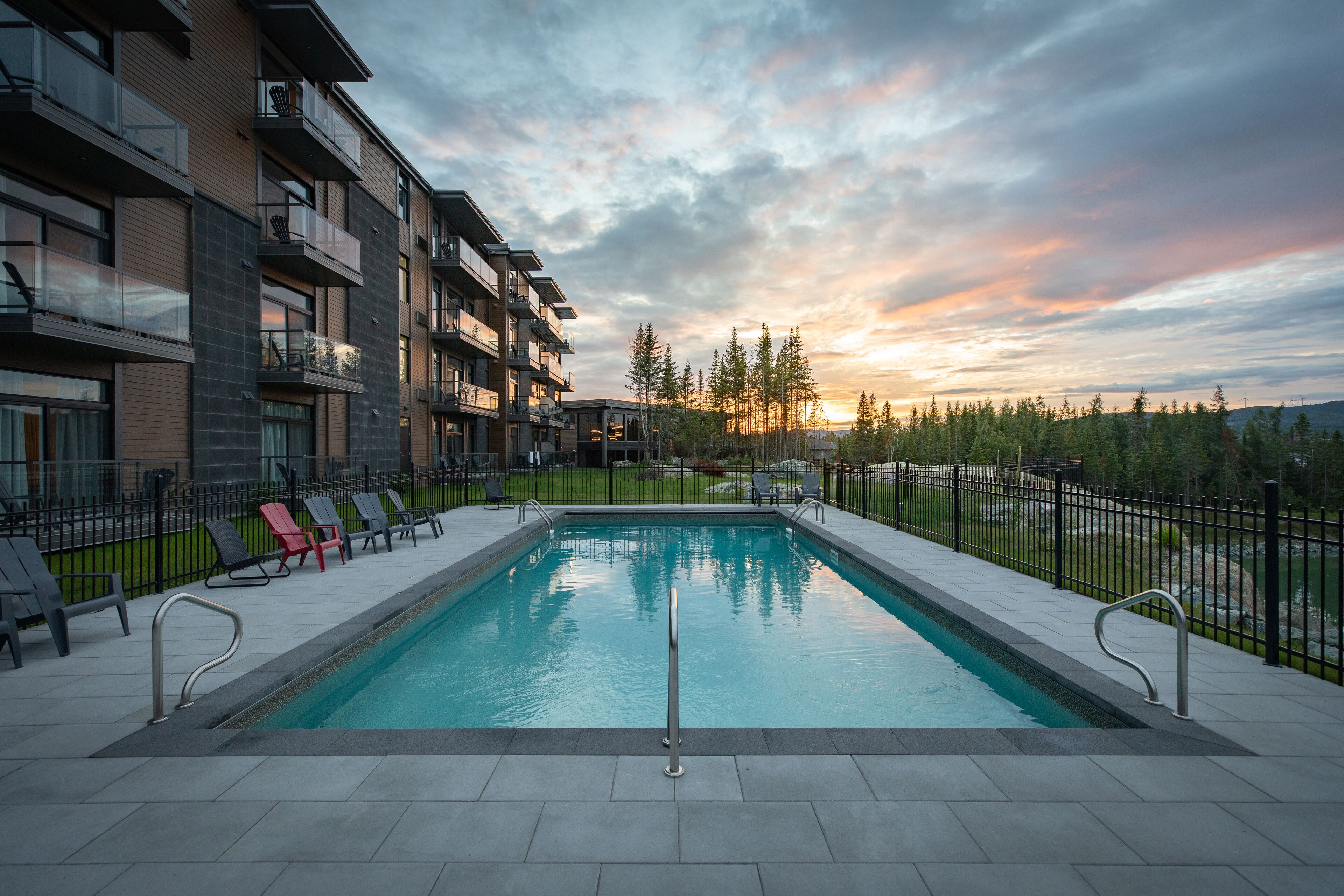 Seasonal outdoor pool, open 9 AM to 9:00 PM, pool umbrellas