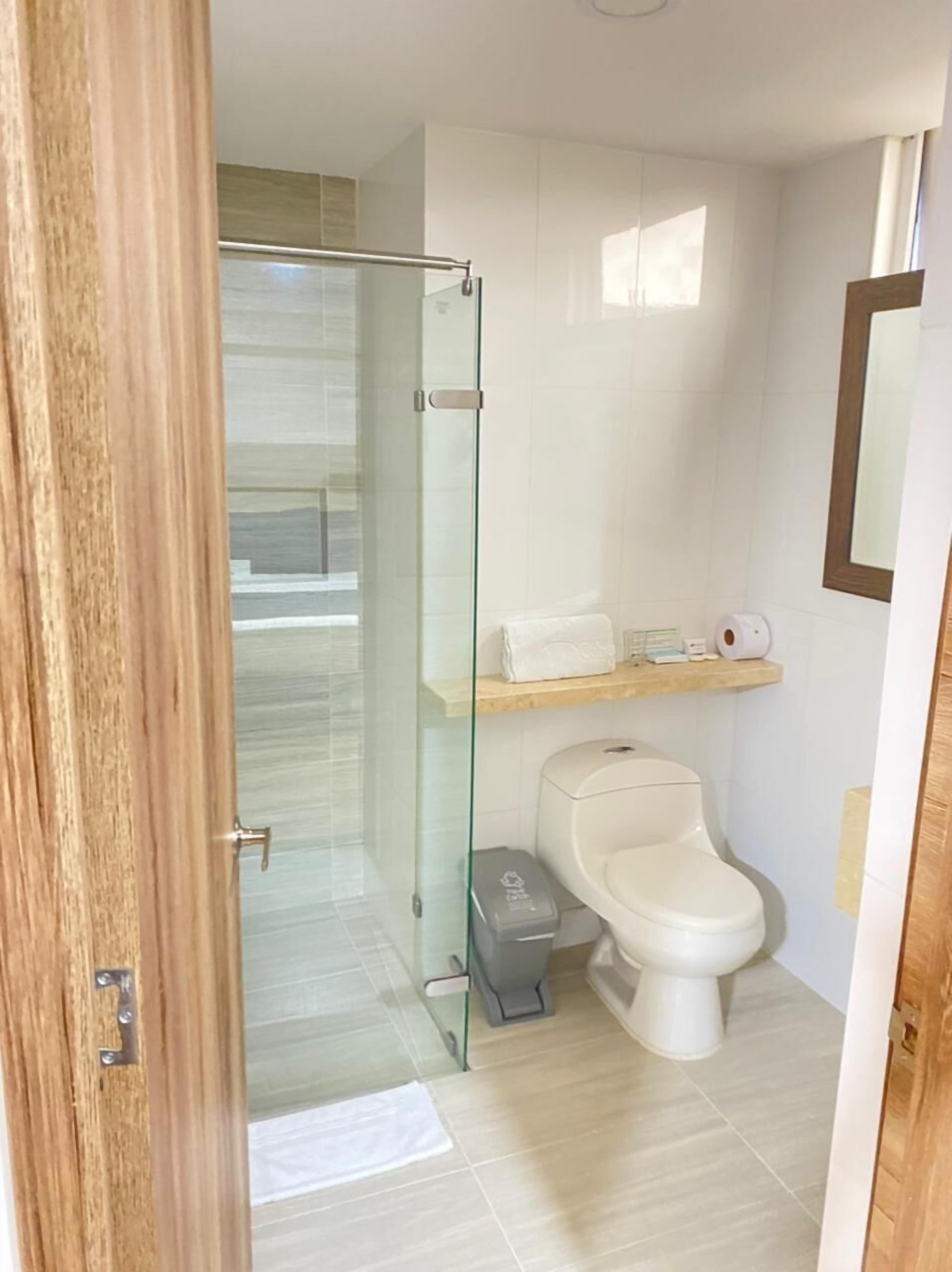 superior triple room | bathroom | free toiletries, hair dryer, towels