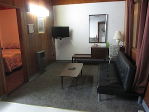 Standard Suite, 1 Bedroom, Kitchenette | Living area | Flat-screen TV - Ace Crown Motel (Medicine Hat)