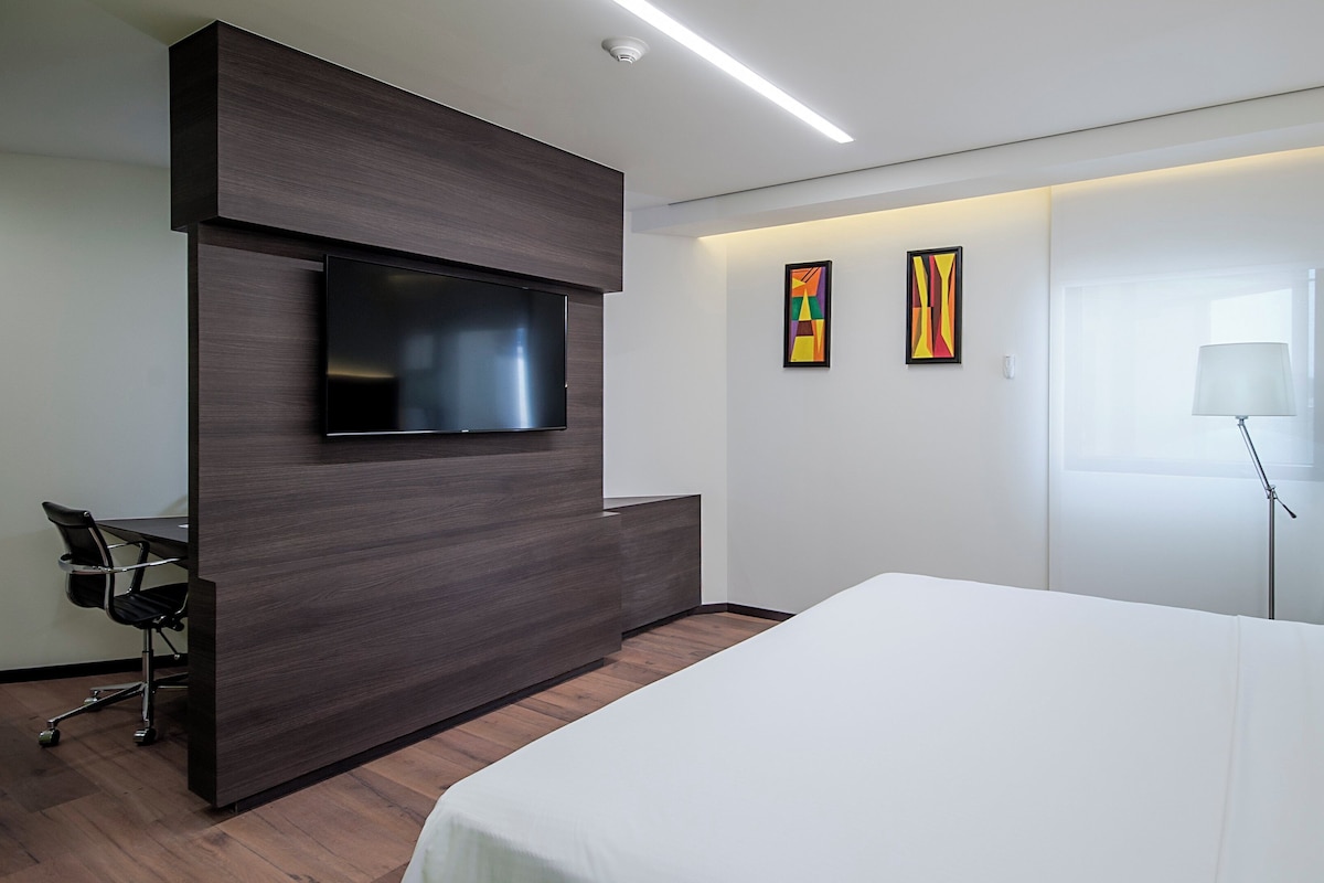 Suite, 1 King Bed | Desk, blackout drapes, iron/ironing board, WiFi (free)
