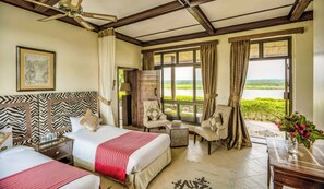 In-room safe, desk, rollaway beds, bed sheets - Paraa Safari Lodge (Paraa)