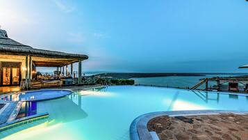 Outdoor pool, pool umbrellas, sun loungers