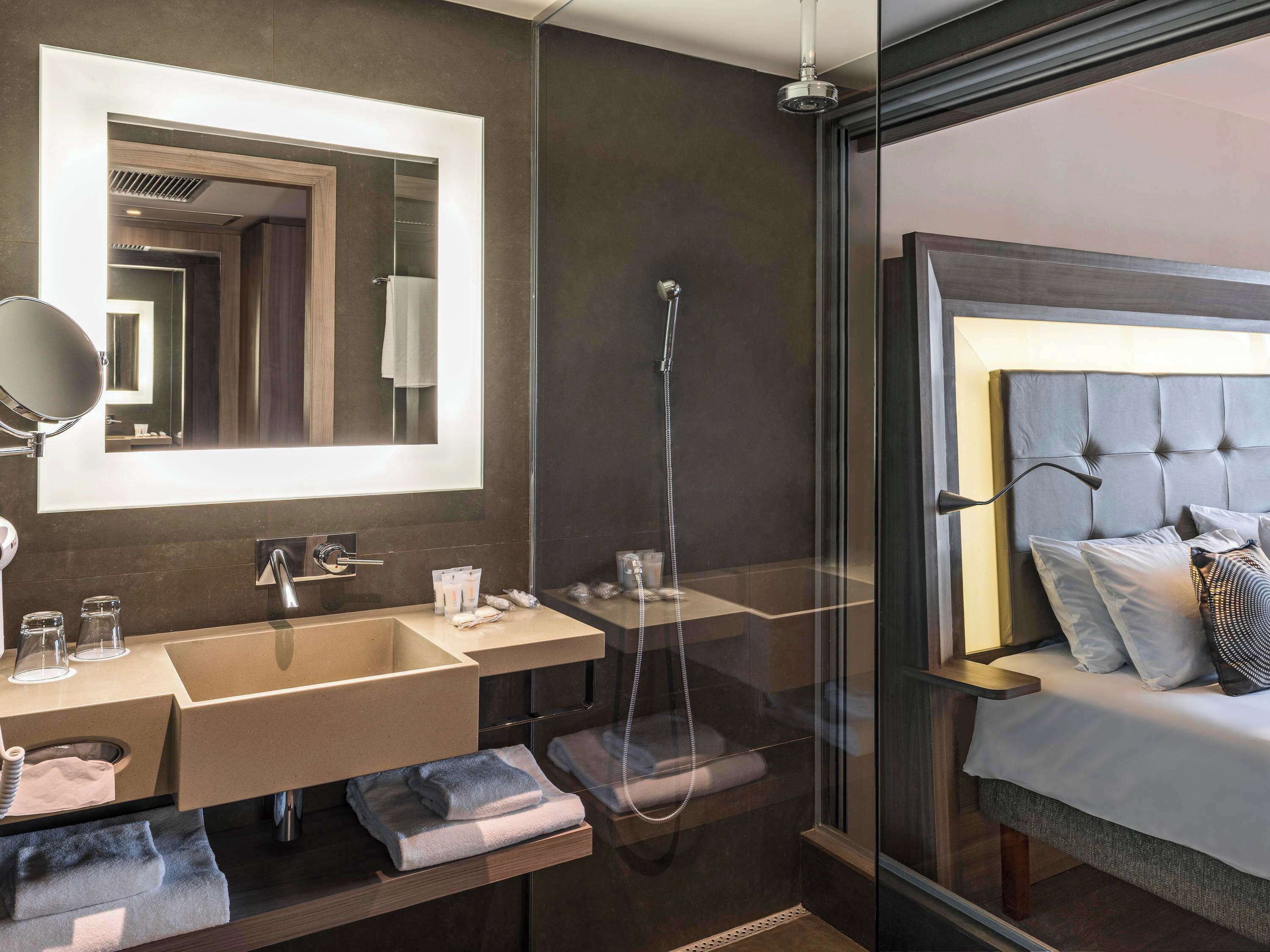 shower, eco-friendly toiletries, hair dryer, towels