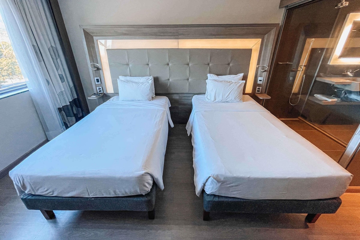 Superior Apartment, 2 Twin Beds | Minibar, in-room safe, desk, soundproofing