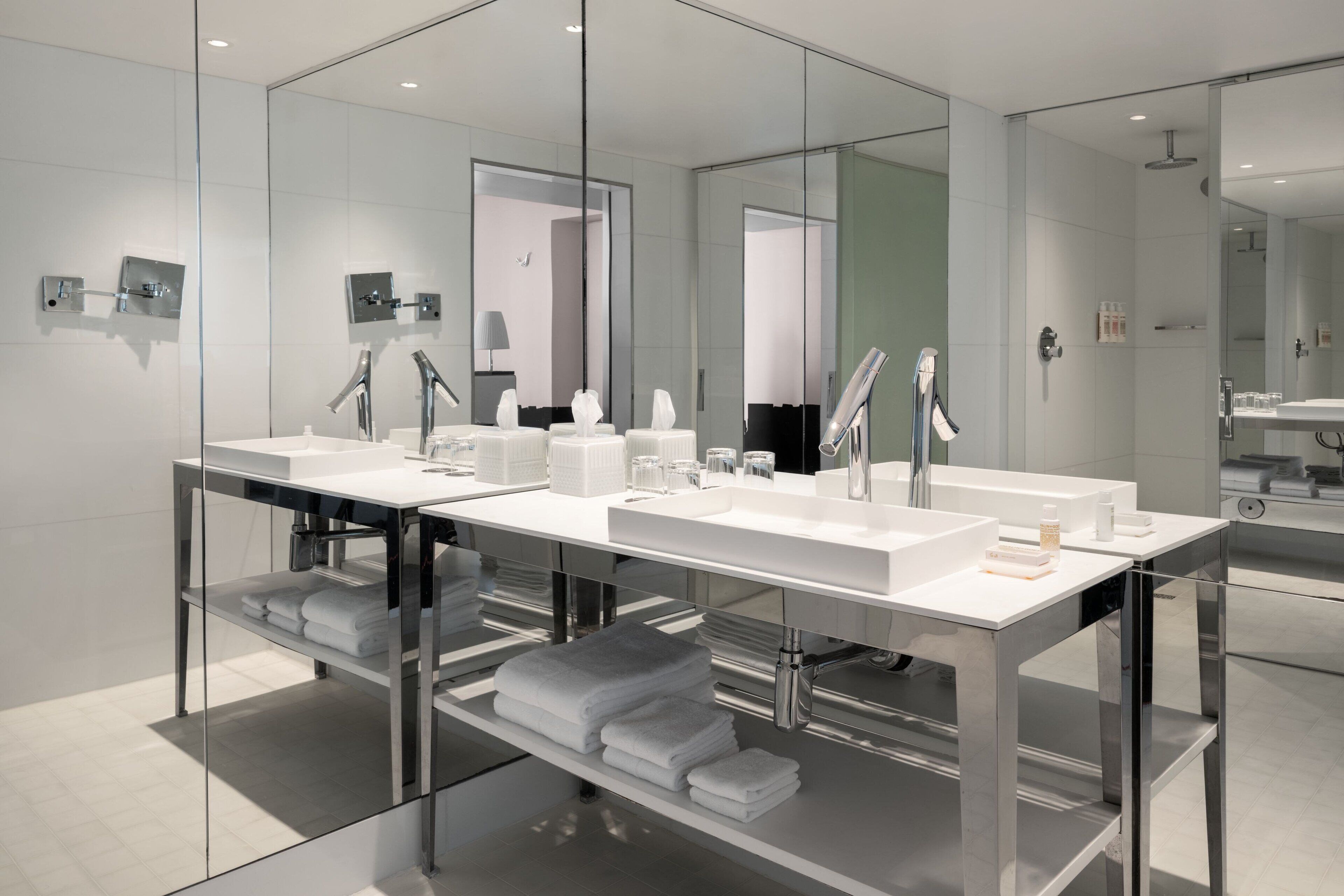 Shower, rainfall showerhead, designer toiletries, hair dryer