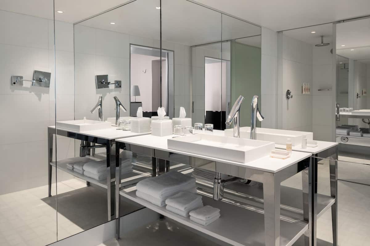 Shower, rainfall showerhead, designer toiletries, hair dryer