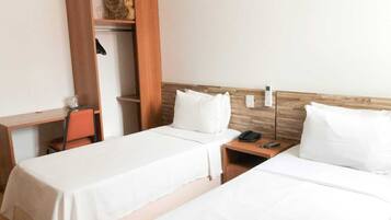 Standard Single Room | Minibar, in-room safe, desk, blackout drapes