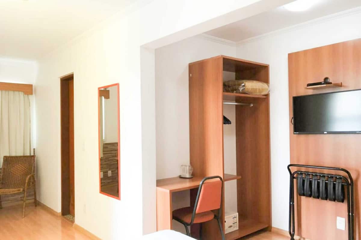 Standard Quadruple Room | Minibar, in-room safe, desk, blackout drapes