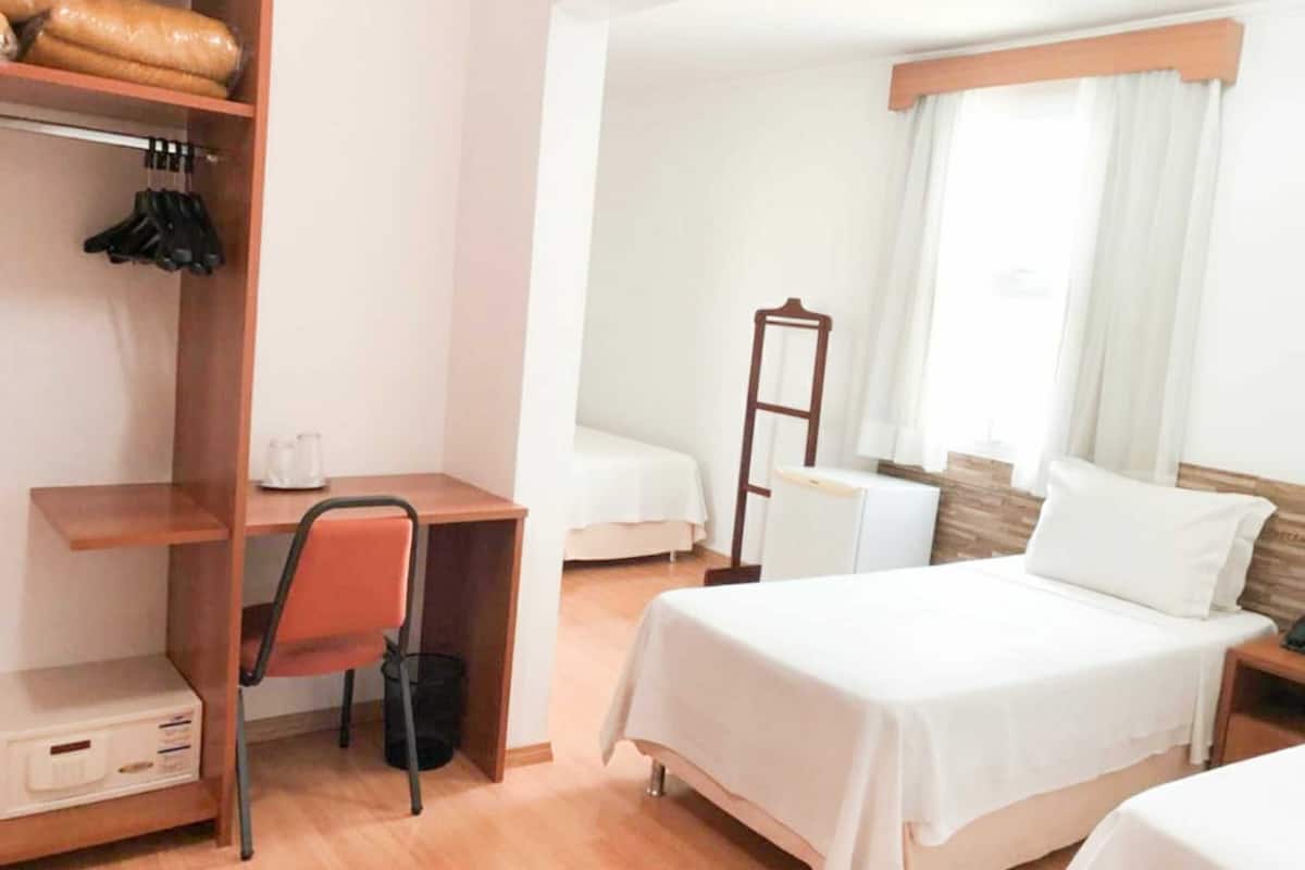 Standard Triple Room, 3 Twin Beds | Minibar, in-room safe, desk, blackout drapes