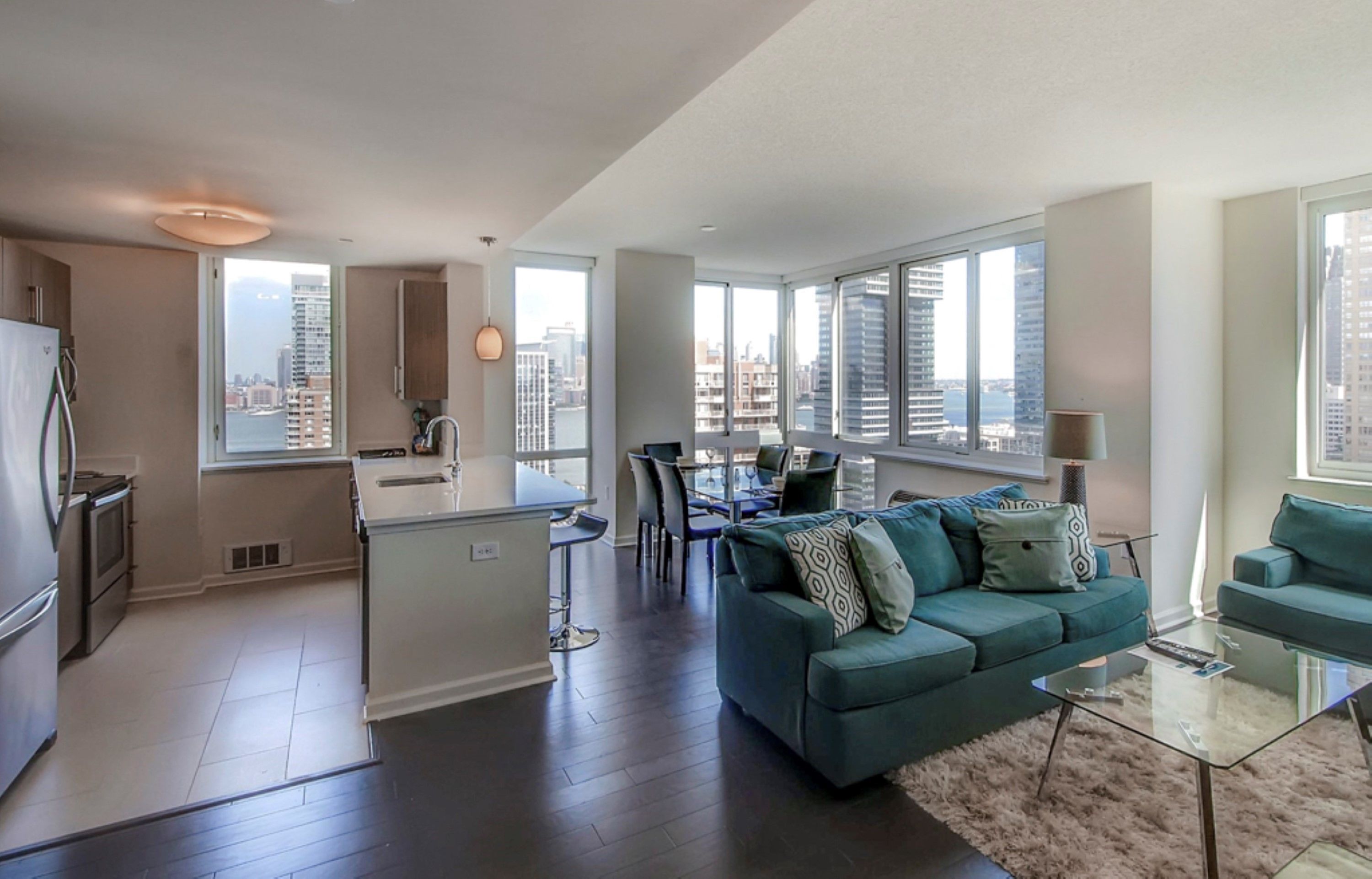 Apartment, 3 Bedrooms | Living room | Flat-screen TV