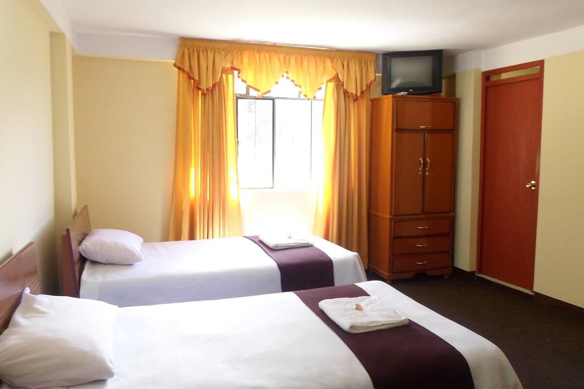 Desk, rollaway beds, free WiFi, bed sheets