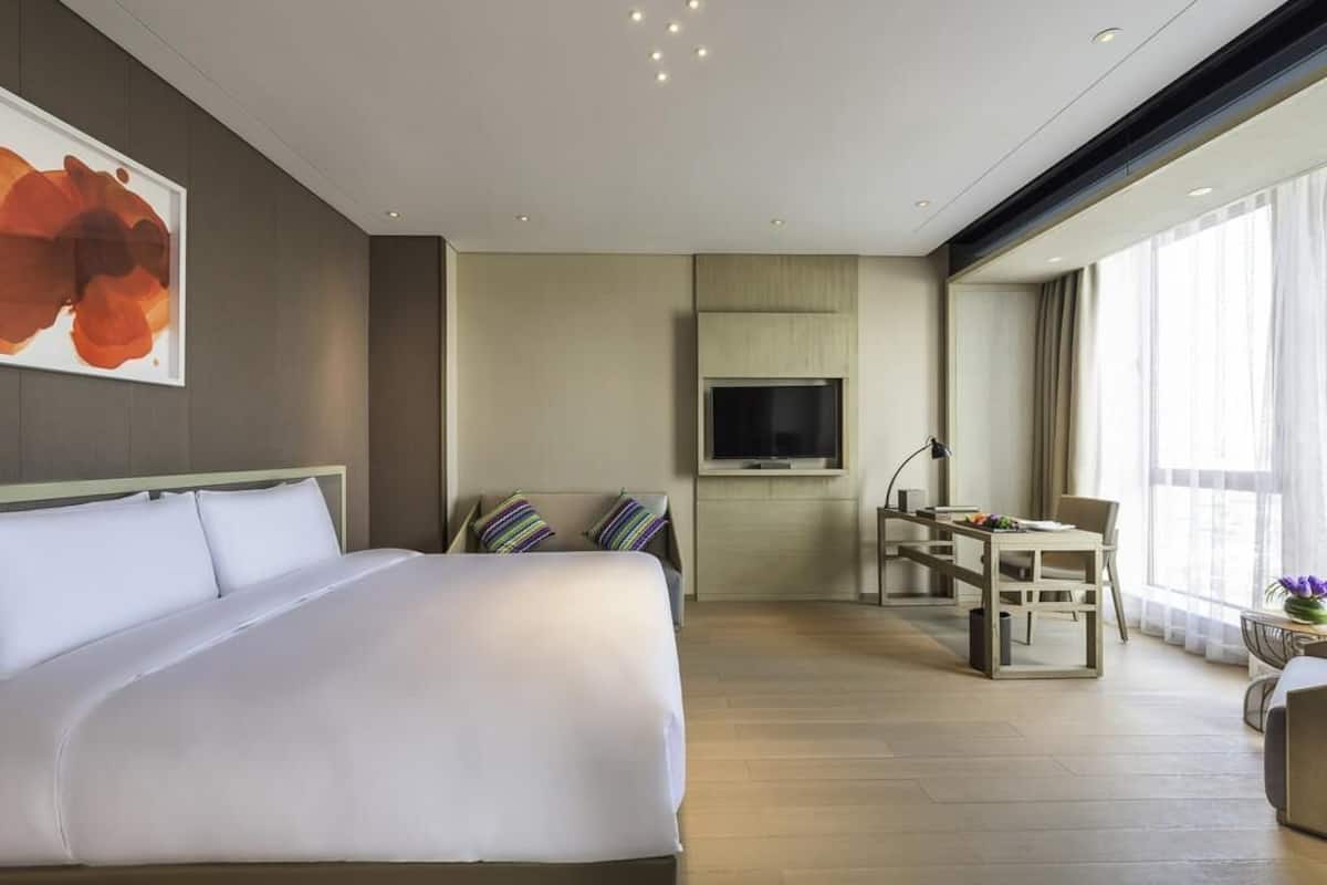 Suíte júnior, 1 cama King | Frigobar, cofres nos quartos, quartos à prova de som