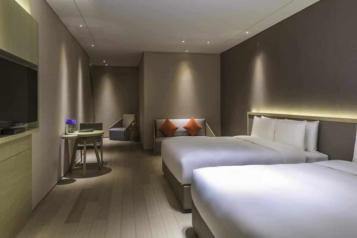 Family Studio, Multiple Beds | Minibar, in-room safe, soundproofing, iron/ironing board