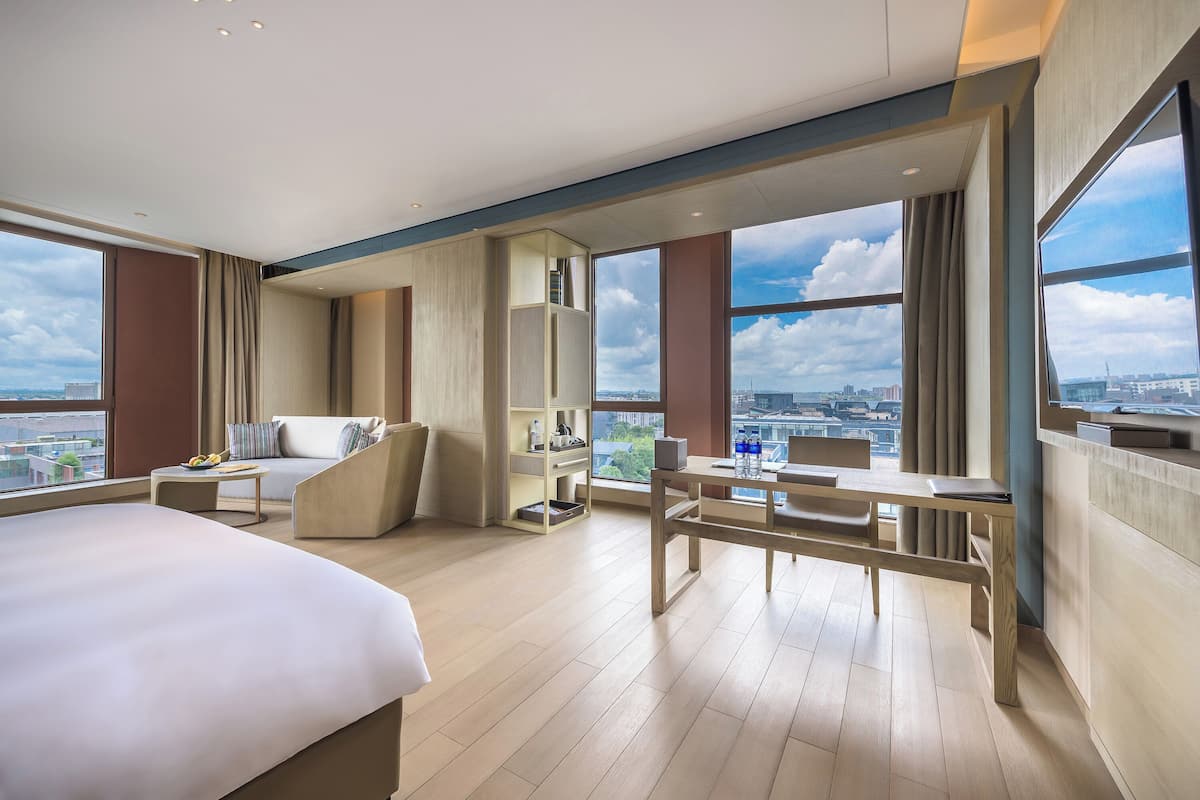 Deluxe Suite, Multiple Beds | Minibar, in-room safe, soundproofing, iron/ironing board (on request)
