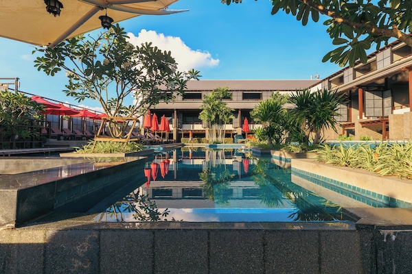 2 outdoor pools, pool umbrellas, sun loungers