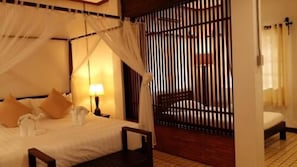 Family suite | Roupas de cama premium, frigobar, cofres nos quartos, escrivaninha