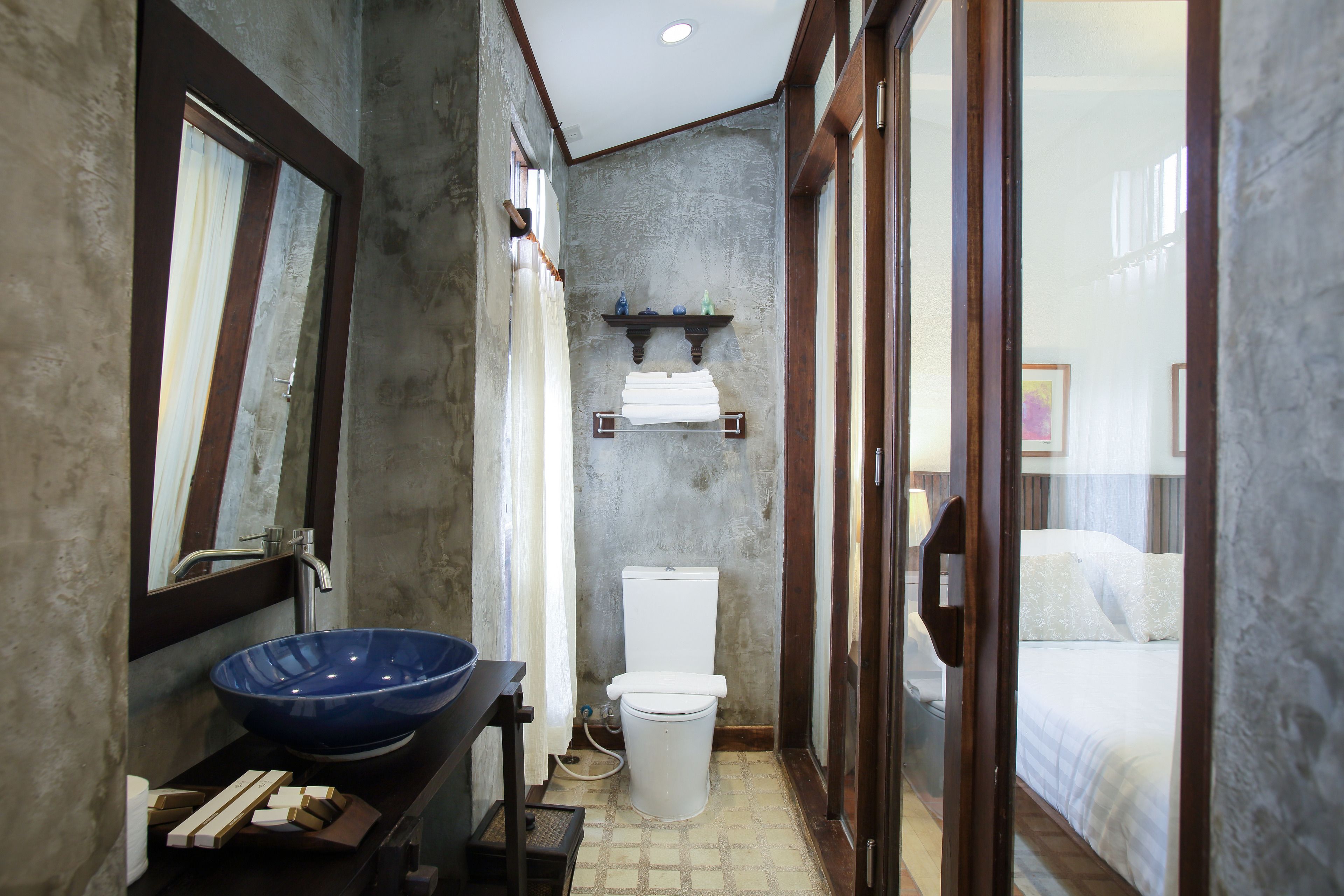 deluxe room | bathroom | shower, free toiletries, hair dryer, bathrobes