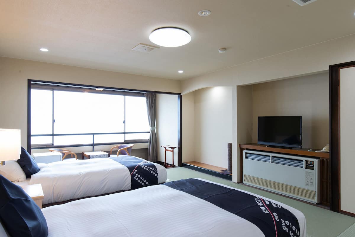 Japanese Room up to 2 guests, Smoking | In-room safe, desk, free WiFi, bed sheets