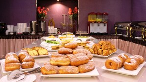A buffet table with various pastries and desserts. - Al Khaleej Grand Hotel (Dubai)