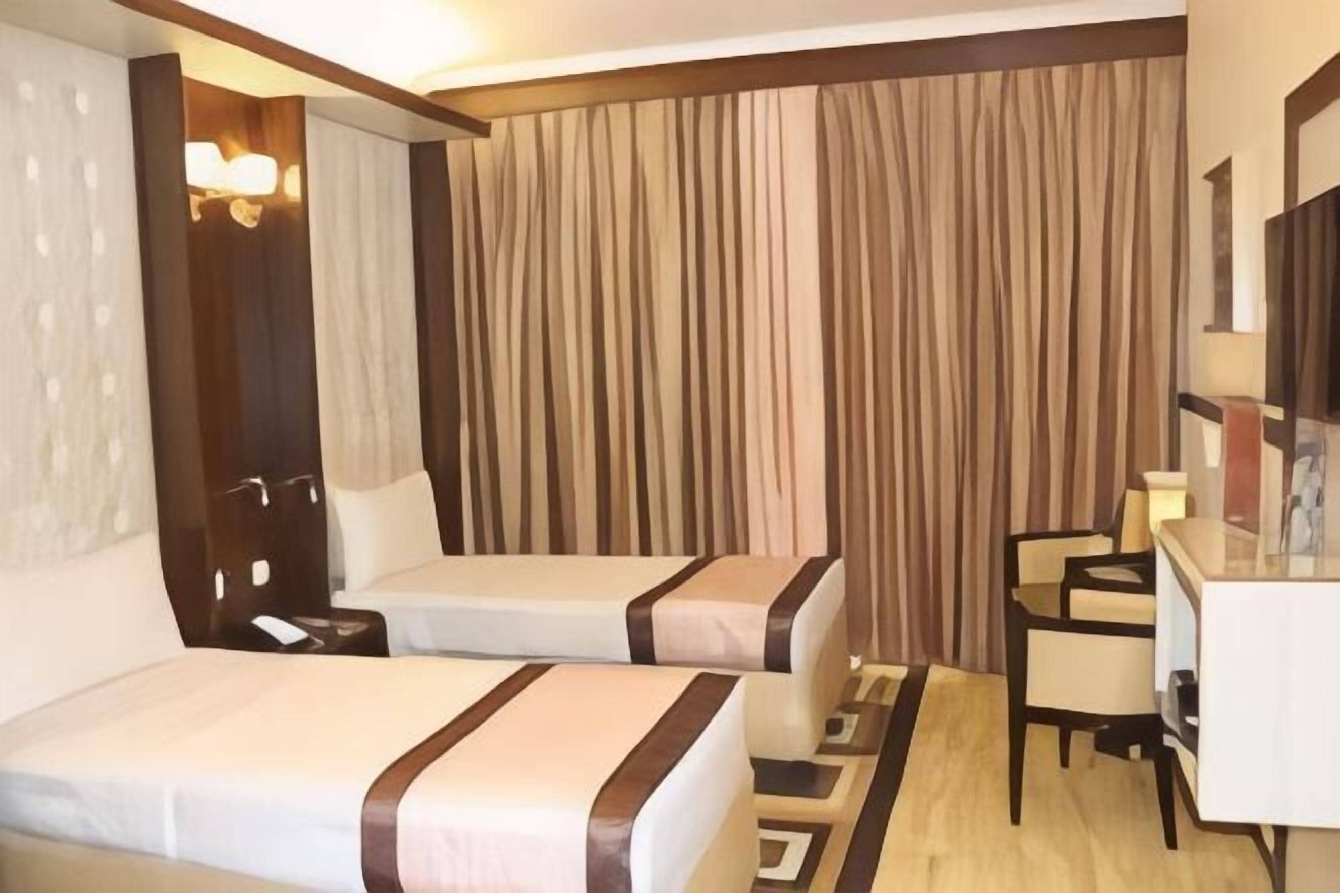Egyptian cotton sheets, premium bedding, down comforters, minibar