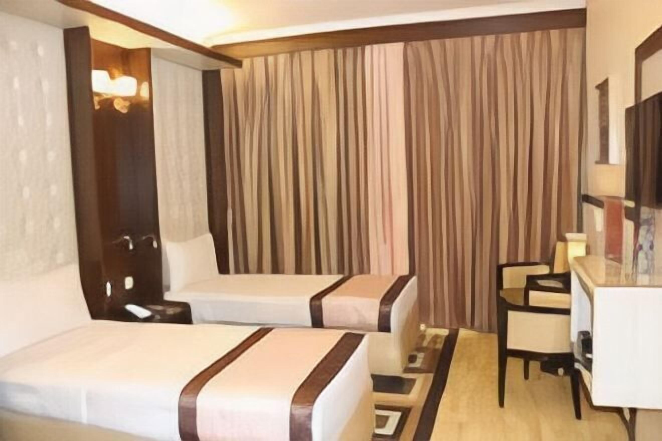 Egyptian cotton sheets, premium bedding, down duvets, minibar