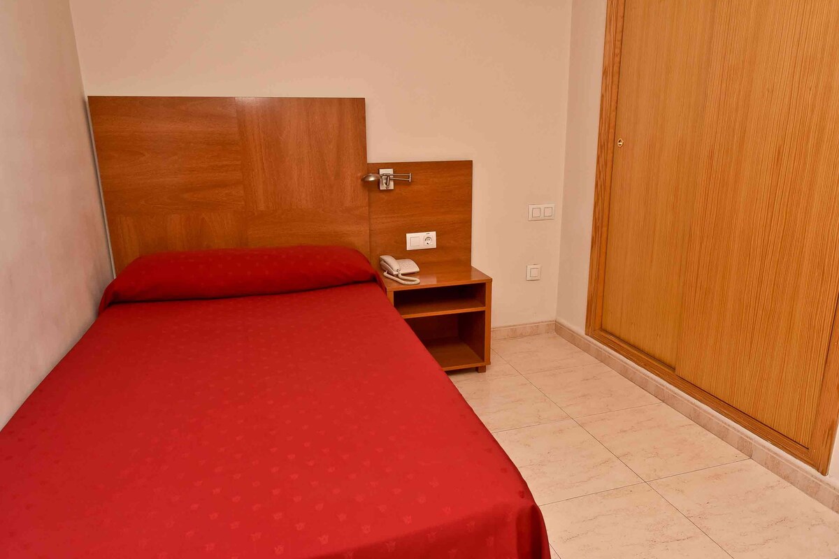 Desk, cribs (free), rollaway beds (surcharge), WiFi (free)