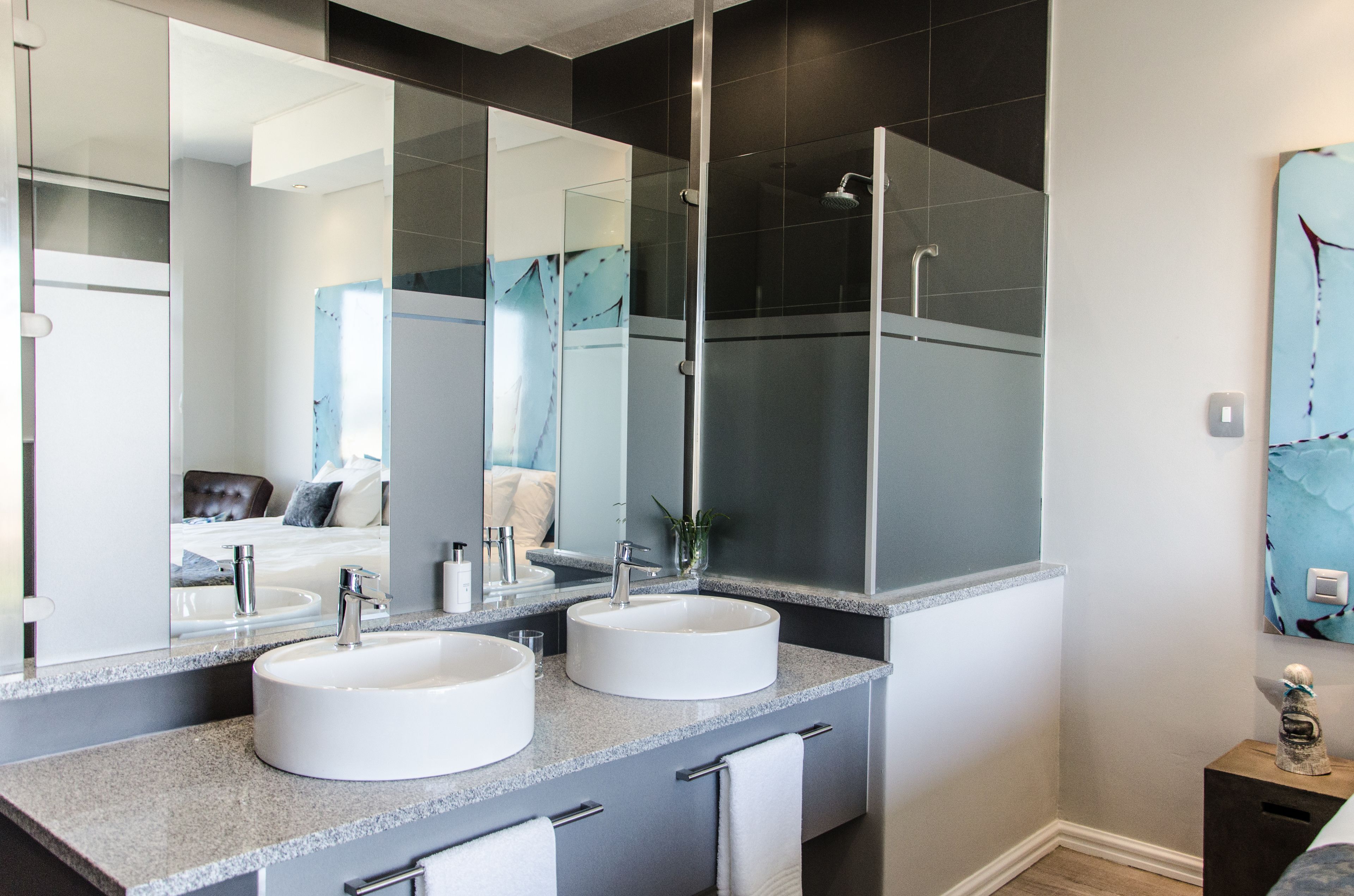 signature room, 1 king bed | bathroom | free toiletries, hair dryer, towels