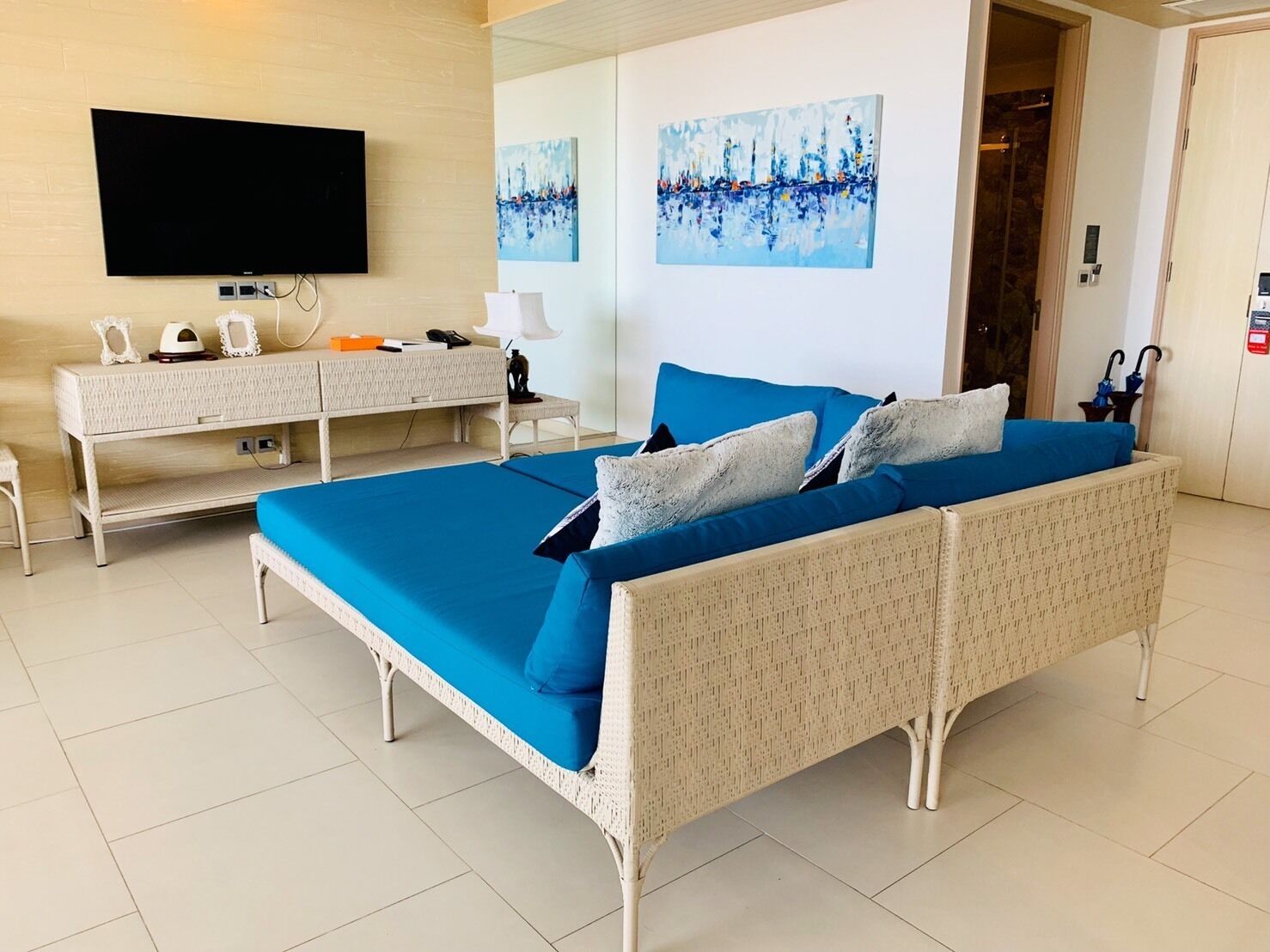 grand beachfront villa | living room | 48-inch led tv with satellite channels, tv