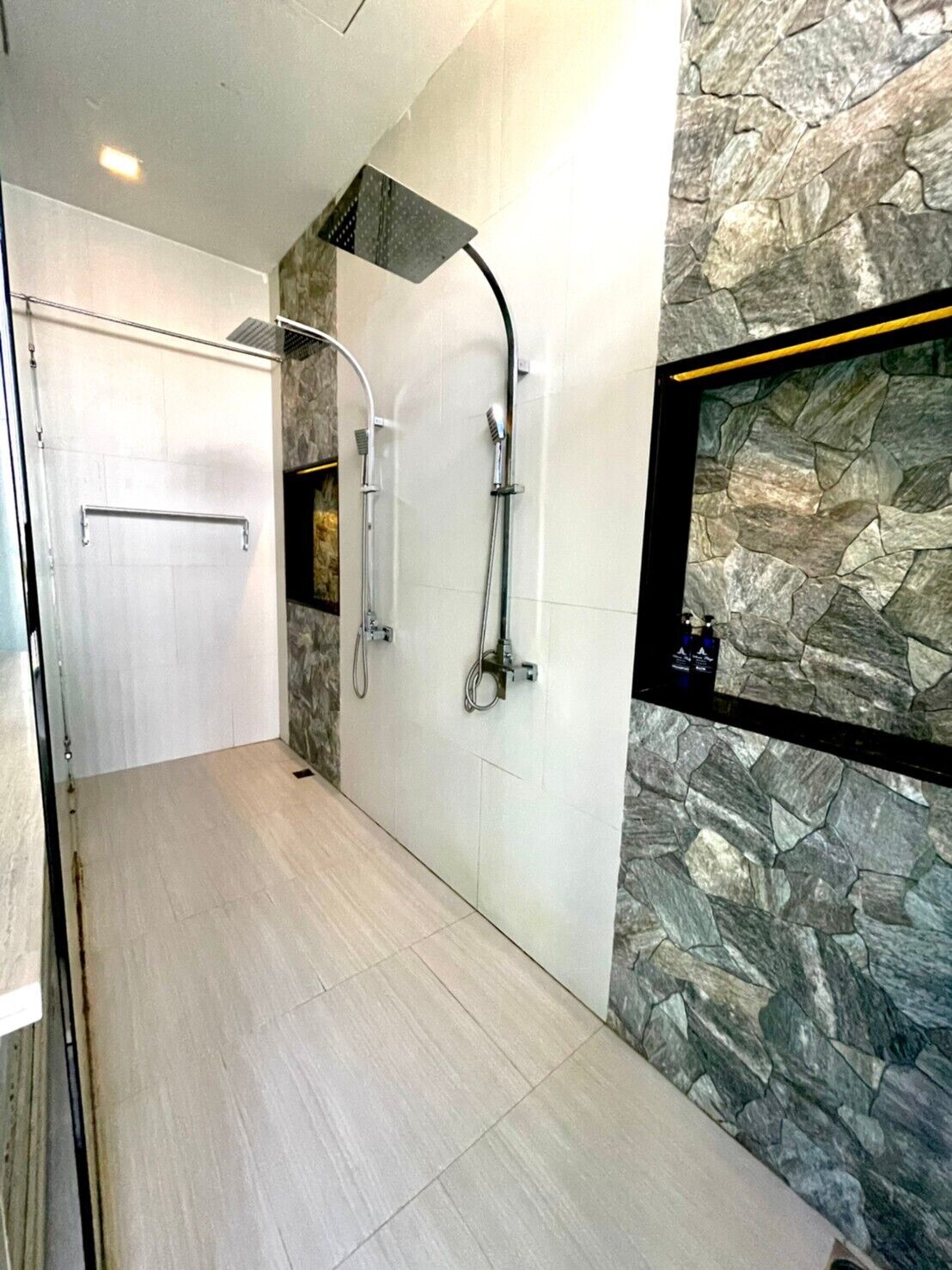 grand beachfront villa | bathroom | shower, rainfall showerhead, designer toiletries, hair dryer