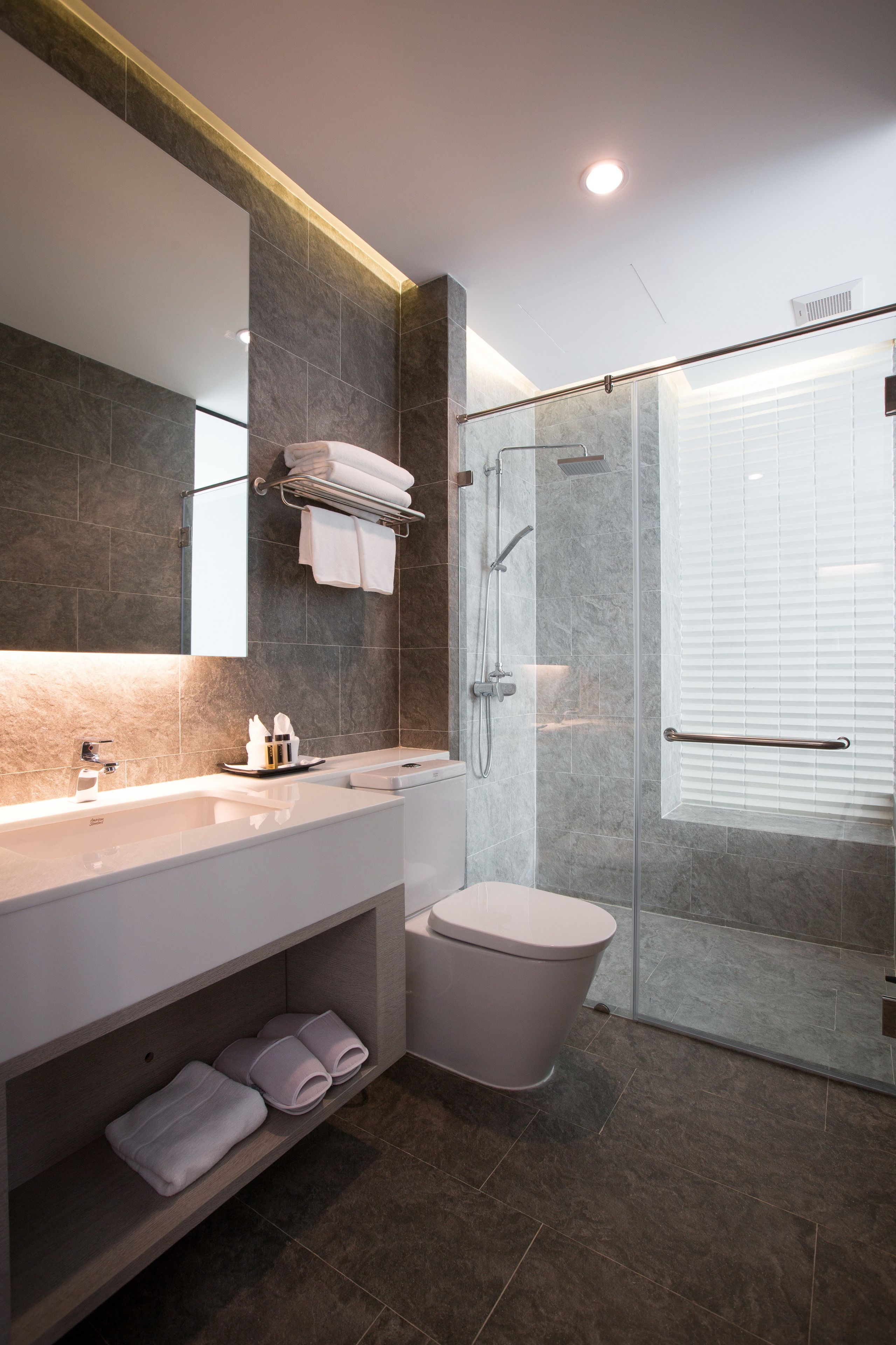 garden deluxe | bathroom | rainfall showerhead, free toiletries, hair dryer, bathrobes