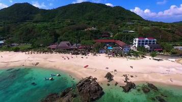 On the beach, white sand