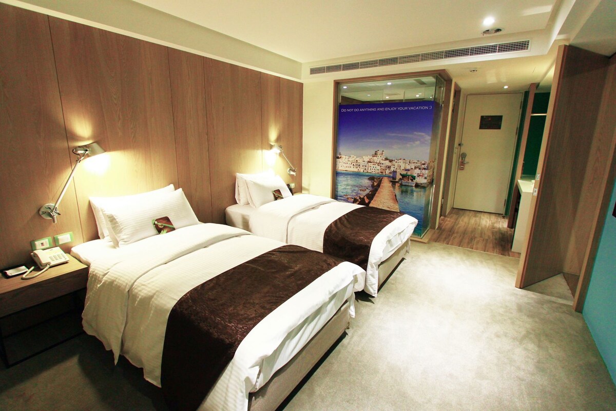 Premium bedding, desk, laptop workspace, blackout curtains