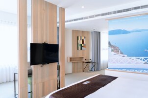 Deluxe Room, 1 King Bed | Premium bedding, desk, laptop workspace, blackout drapes