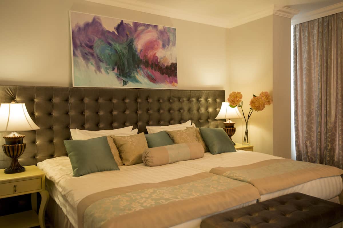 Deluxe Double or Twin Room | Minibar, in-room safe, desk, soundproofing