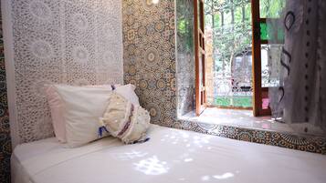 Chambre Triple Confort | Draps en coton égyptien, literie de qualité supérieure