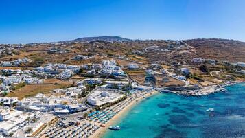 Sun loungers, beach umbrellas, beach towels, 4 beach bars