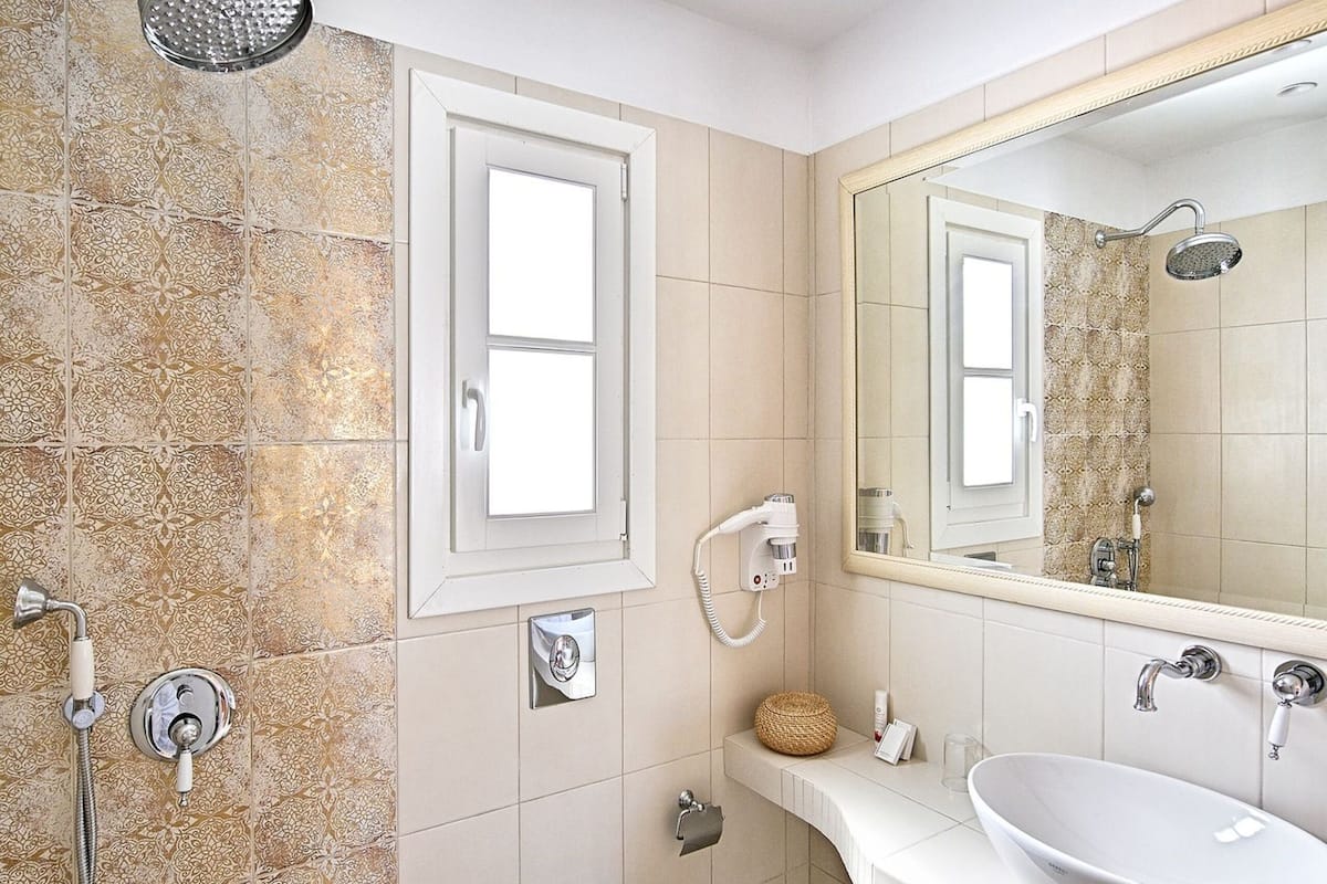 one bedroom junior suite sea view | bathroom | free toiletries, hair dryer, towels, soap