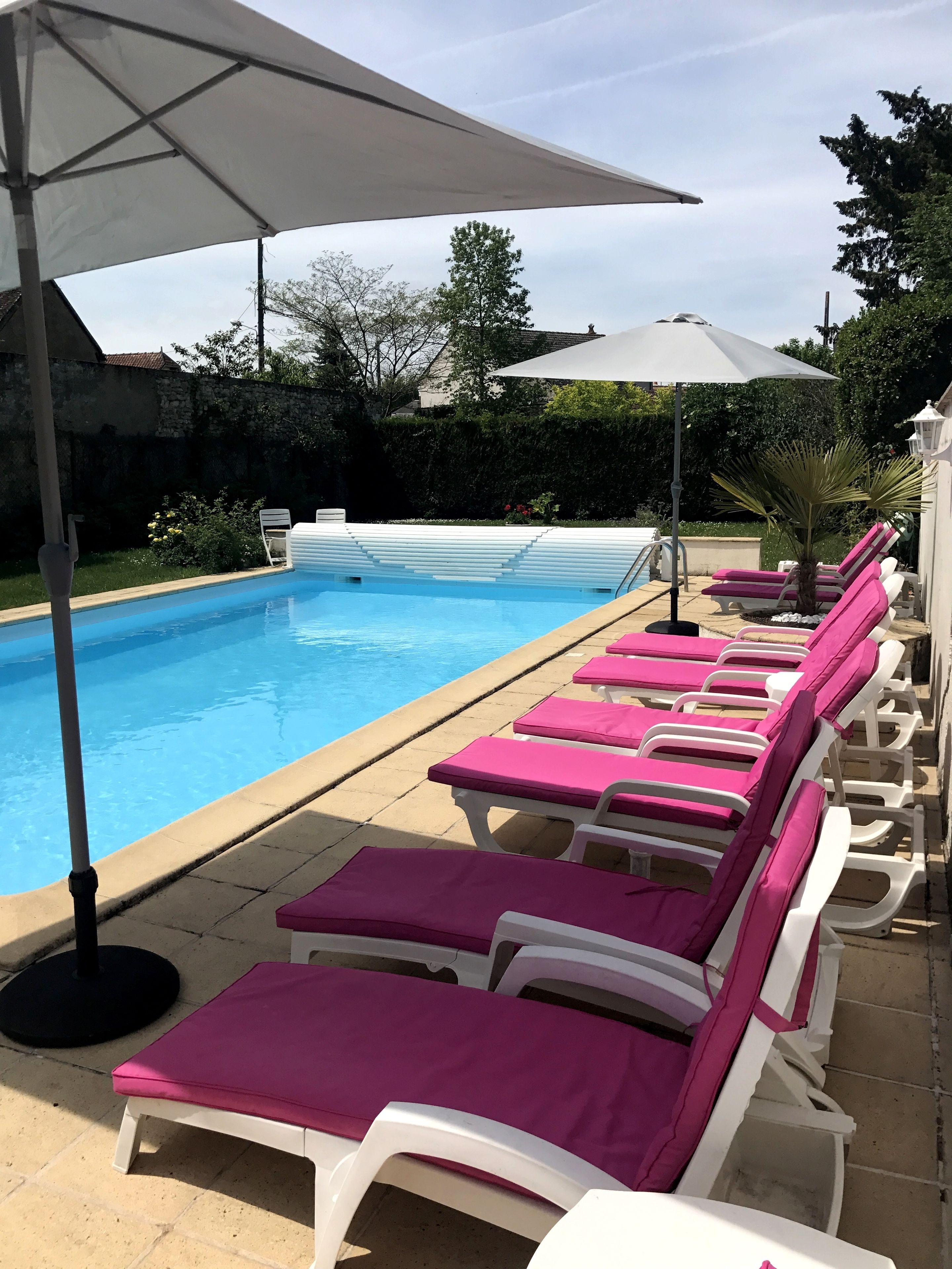 outdoor pool, pool loungers