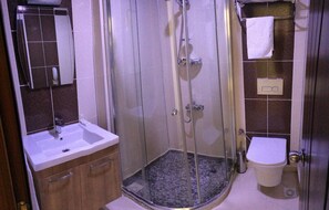 Shower, free toiletries, hair dryer, slippers